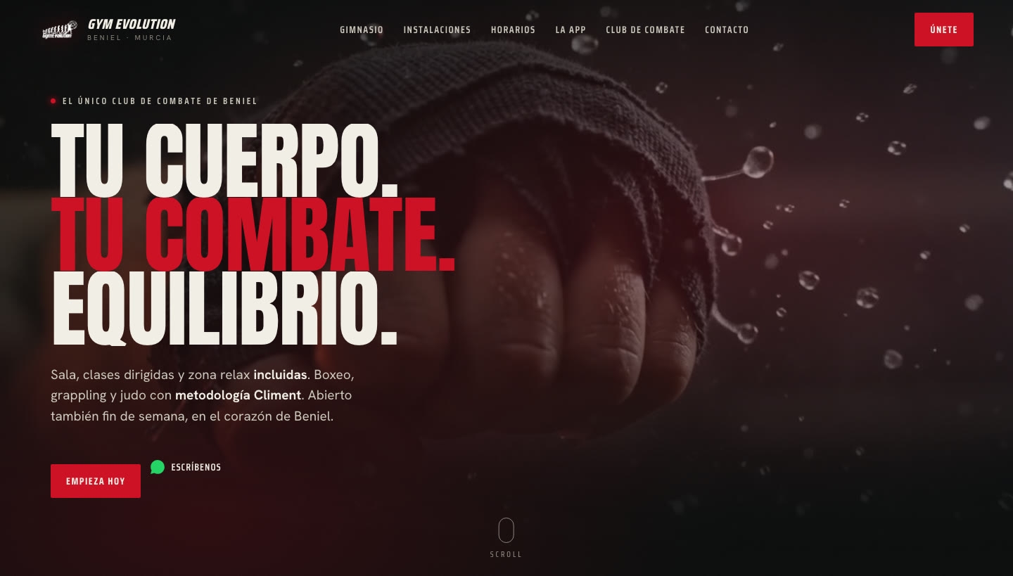 Gym Evolution — hero con vídeo de un puño vendado y el titular Tu cuerpo, tu combate, equilibrio